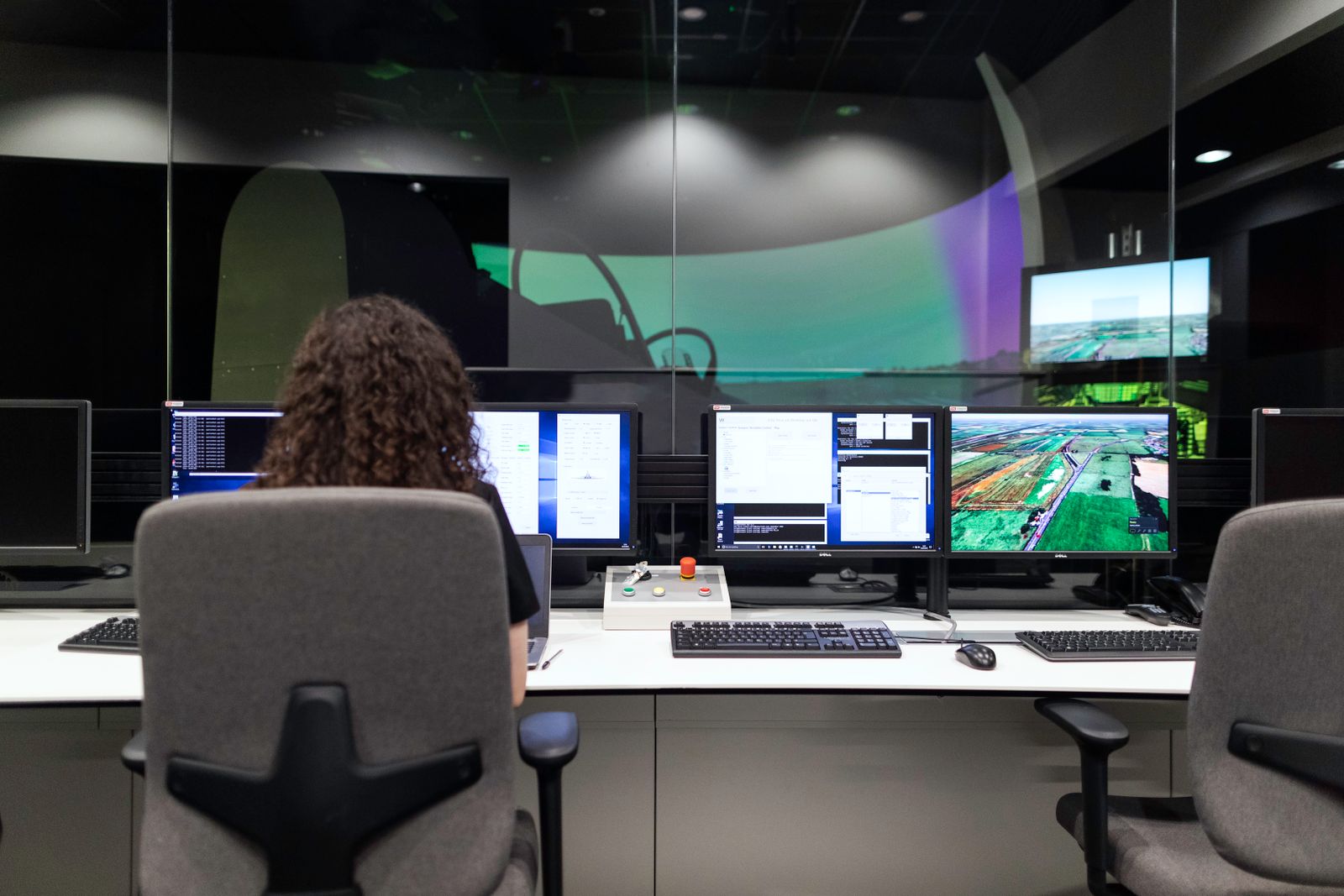 An engineer reviewing system data