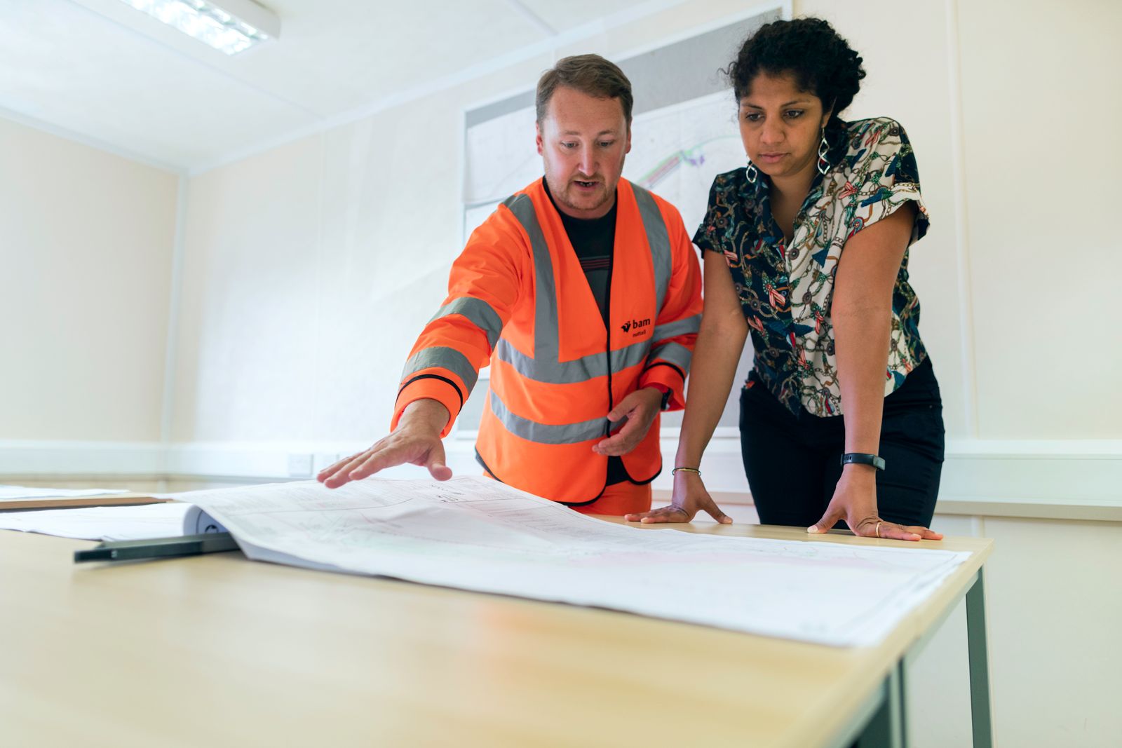 Engineers reviewing a commercial solar layout